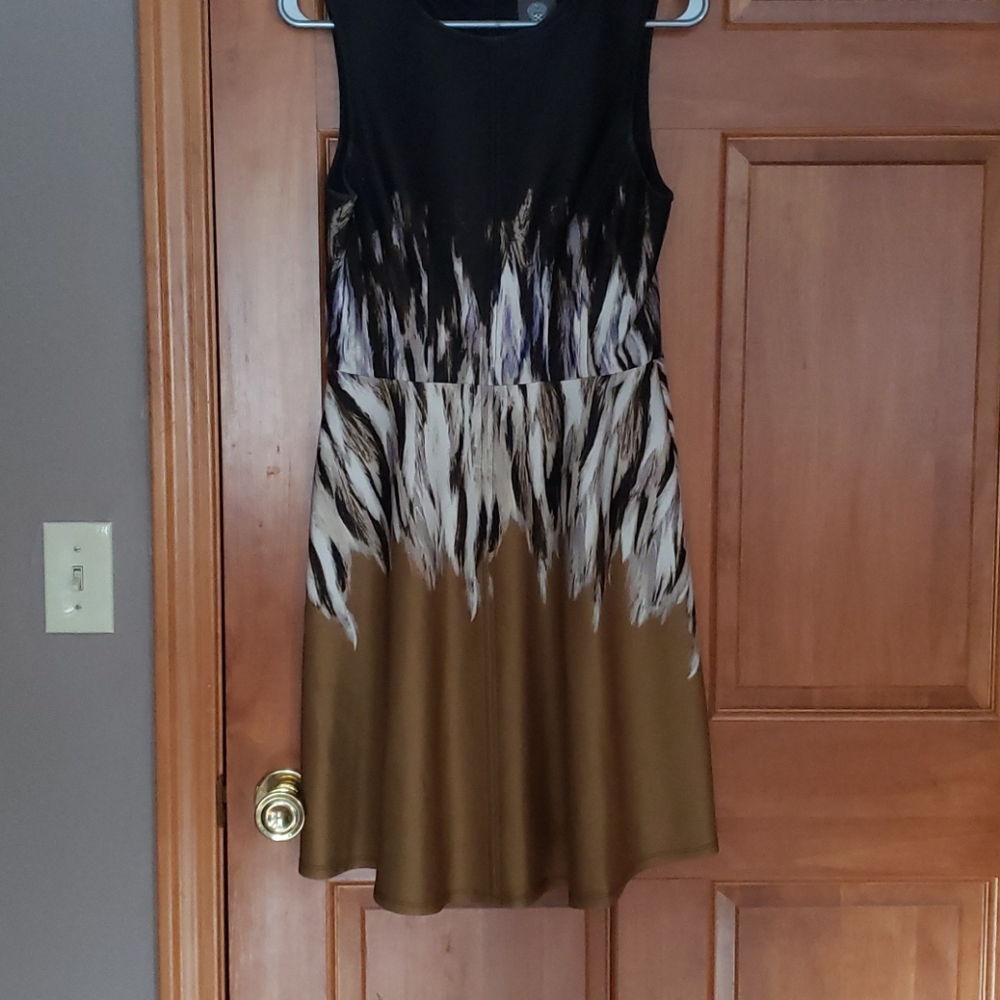 Sleeveless black and gold dress